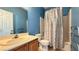 Practical bathroom with shower and tub combo, with safety grab bars installed at 988 Upper Meadows Pl, Henderson, NV 89052