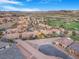 Scenic aerial view of the community featuring lush golf course views and mountain views at 1 Cerchio Basso, Henderson, NV 89011