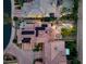 Aerial view of a stunning home with a tile roof, solar panels, and an outdoor entertainment space at 1 Cerchio Basso, Henderson, NV 89011