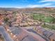 Scenic aerial view of the community featuring lush golf course views and mountain views at 1 Cerchio Basso, Henderson, NV 89011