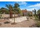 Backyard with stone patio and desert landscaping at 1 Cerchio Basso, Henderson, NV 89011