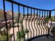 Wrought iron balcony with views of the community, landscaping, and surrounding mountains at 1 Cerchio Basso, Henderson, NV 89011
