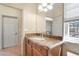Granite countertop on the vanity in a bright bathroom at 1 Cerchio Basso, Henderson, NV 89011