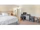 Comfortable bedroom featuring a quaint desk area, neutral tones, and ample natural light at 1 Cerchio Basso, Henderson, NV 89011