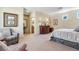 Comfortable main bedroom featuring neutral colors, sitting area, and ensuite bathroom at 1 Cerchio Basso, Henderson, NV 89011