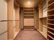 Organized walk-in closet with custom shelving and ample storage space at 1 Cerchio Basso, Henderson, NV 89011