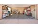 Spacious garage with ample storage, shelving, and concrete flooring at 1 Cerchio Basso, Henderson, NV 89011
