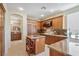 Kitchen featuring wood cabinets, granite countertops and stainless steel appliances at 1 Cerchio Basso, Henderson, NV 89011