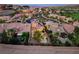 The home is located in a vibrant community surrounded by lush landscaping and mature trees at 1 Cerchio Basso, Henderson, NV 89011