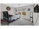 Bright bedroom featuring a cozy bed, ample natural light, and modern decor, creating a relaxing and inviting space at 1020 High Altitude Ave, North Las Vegas, NV 89032