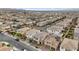 Aerial view of a planned community with neatly arranged homes and streets at 10324 Stroma Ave, Las Vegas, NV 89166