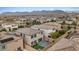 Aerial view of a backyard featuring a patio with artificial turf and a privacy fence at 10324 Stroma Ave, Las Vegas, NV 89166