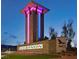 Community entrance sign with illuminated letters and modern design at 10324 Stroma Ave, Las Vegas, NV 89166