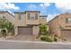 Charming two-story home featuring a brick driveway and well-manicured landscaping at 10324 Stroma Ave, Las Vegas, NV 89166