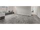 Upstairs living area with gray carpet and a view of the stairway at 10324 Stroma Ave, Las Vegas, NV 89166