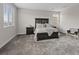 Spacious main bedroom with neutral walls, carpeted floors, dark wood furniture, and plenty of natural light at 10324 Stroma Ave, Las Vegas, NV 89166