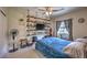 Bedroom with custom shelves and a large window bringing in natural light at 10623 Auburn Springs Ave, Las Vegas, NV 89166