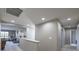 Bright upstairs hallway featuring recessed lighting, neutral paint, and access to bedrooms and living spaces at 10623 Auburn Springs Ave, Las Vegas, NV 89166