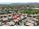 Stunning aerial view of a well-maintained neighborhood near Tree Top Park with mountain views at 10805 Hollow Creek Ln, Las Vegas, NV 89144