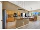 Spacious kitchen with granite counters, stainless steel appliances, and tile flooring at 10805 Hollow Creek Ln, Las Vegas, NV 89144