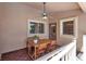 Cozy covered patio featuring a ceiling fan and furniture for ultimate relaxation at 10805 Hollow Creek Ln, Las Vegas, NV 89144