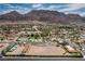 Aerial view of the Community amenities with tennis courts, pool, RV parking and horse arena at 1157 Morning Sun Way, Las Vegas, NV 89110