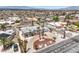 Aerial view of a desert landscaped home with mature palm trees and a circular driveway at 1157 Morning Sun Way, Las Vegas, NV 89110