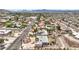 Aerial view of a desert landscaped home with mature palm trees and solar panels at 1157 Morning Sun Way, Las Vegas, NV 89110