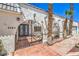 Wrought iron gated front courtyard and entry to the home at 1157 Morning Sun Way, Las Vegas, NV 89110
