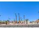 Charming single-story home featuring desert landscaping and an arched gated front entry at 1157 Morning Sun Way, Las Vegas, NV 89110