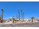 Charming single-story home with desert landscaping and an arched gated front entry at 1157 Morning Sun Way, Las Vegas, NV 89110