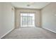 Spacious bedroom with sliding glass door at 1275 Ice Park St # 101, Las Vegas, NV 89135