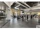 Spacious gym featuring modern equipment, high ceilings, large windows, and an accent wall mural at 1275 Ice Park St # 101, Las Vegas, NV 89135