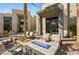 Outdoor lounge area with comfortable seating and modern fire pits for relaxation and socializing at 1275 Ice Park St # 101, Las Vegas, NV 89135