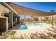 Inviting pool area features ample lounging space at 1275 Ice Park St # 101, Las Vegas, NV 89135