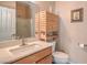 Neutral bathroom featuring a spacious vanity and glass door shower at 1420 Gilbert Creek Ave, North Las Vegas, NV 89031