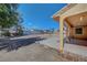 Spacious backyard with gravel landscaping and covered patio, ideal for outdoor activities at 1560 Arabian Dr, Henderson, NV 89002
