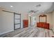 Primary bedroom with ensuite bathroom, hardwood floors and updated sliding closet door at 1560 Arabian Dr, Henderson, NV 89002