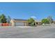 Inviting single-story house with a well-kept front yard, solar panels and an attached garage at 1560 Arabian Dr, Henderson, NV 89002