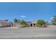 Charming single-story home with desert landscaping, solar panels, and a two-car garage at 1560 Arabian Dr, Henderson, NV 89002