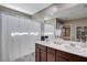 This bathroom features a double sink vanity, toilet, and shower with tub at 1637 Harvest Pecan Ct, Las Vegas, NV 89108