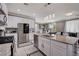 Contemporary kitchen featuring granite counters, stainless appliances, and stylish decor at 1637 Harvest Pecan Ct, Las Vegas, NV 89108