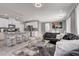 Modern open floor plan, showcasing the living room and kitchen layout at 1637 Harvest Pecan Ct, Las Vegas, NV 89108