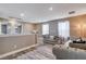 Upstairs loft featuring neutral colors, comfortable seating, and ample space at 1637 Harvest Pecan Ct, Las Vegas, NV 89108
