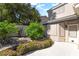 Landscaped backyard showcasing a charming garden, verdant bushes, and a well-maintained patio at 188 Carthage St, Henderson, NV 89074