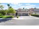 Beautiful two-story home with well-maintained landscaping, a three-car garage, and a spacious driveway at 188 Carthage St, Henderson, NV 89074