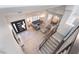 Bright open-concept living room with modern decor, high ceilings, and a view of the dining area at 188 Carthage St, Henderson, NV 89074