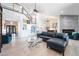 Open concept living area with fireplace, high ceilings, and modern furnishings at 188 Carthage St, Henderson, NV 89074