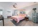 Bright bedroom featuring modern décor, ceiling fan and wood laminate flooring at 188 Carthage St, Henderson, NV 89074