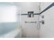 Close up of tiled glass enclosed shower with built-in shower niche at 188 Carthage St, Henderson, NV 89074